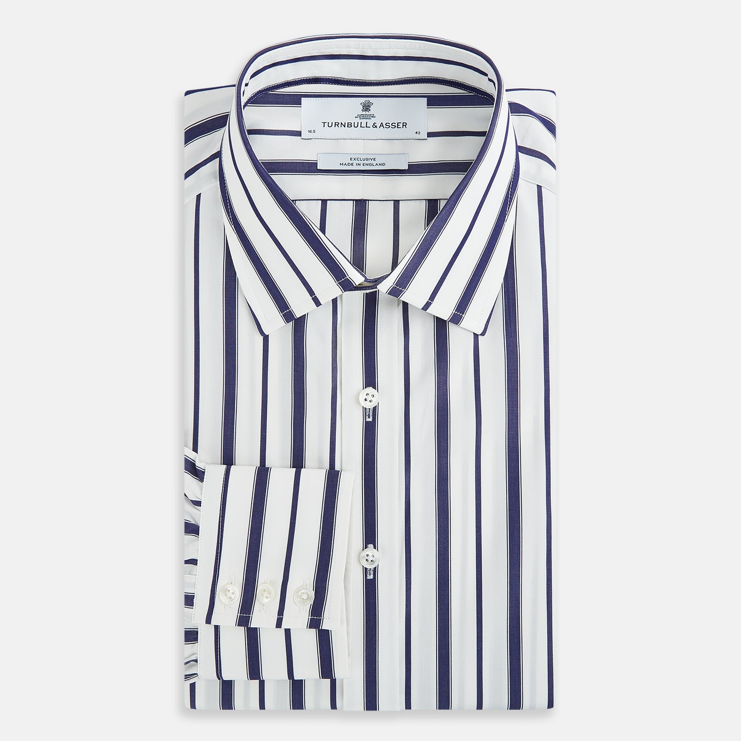 View 5 of product The Navy Double Stripe Mayfair Shirt by Turnbull & Asser features classic long sleeves, buttoned cuffs, a collar, and a slightly curved hem with timeless vertical navy and white stripes.