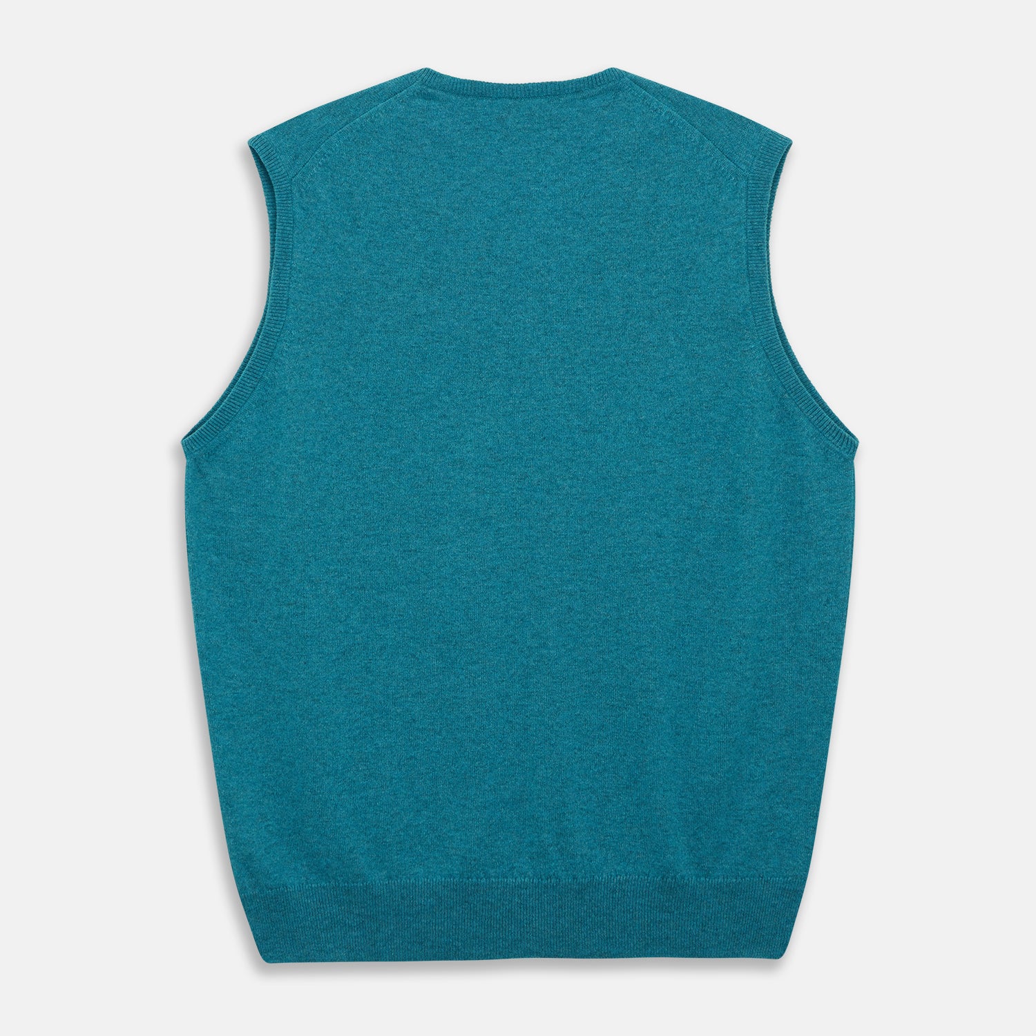 View 3 of product The Teal Ifor Slipover by Turnbull & Asser is a sleeveless, V-neck knit made in Scotland from lightweight cashmere, shown in teal blue against a white background.