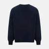 View 3 of product The Turnbull & Asser Navy Cashmere V-neck Jumper features long sleeves with ribbed cuffs and hem, shown against a white background.