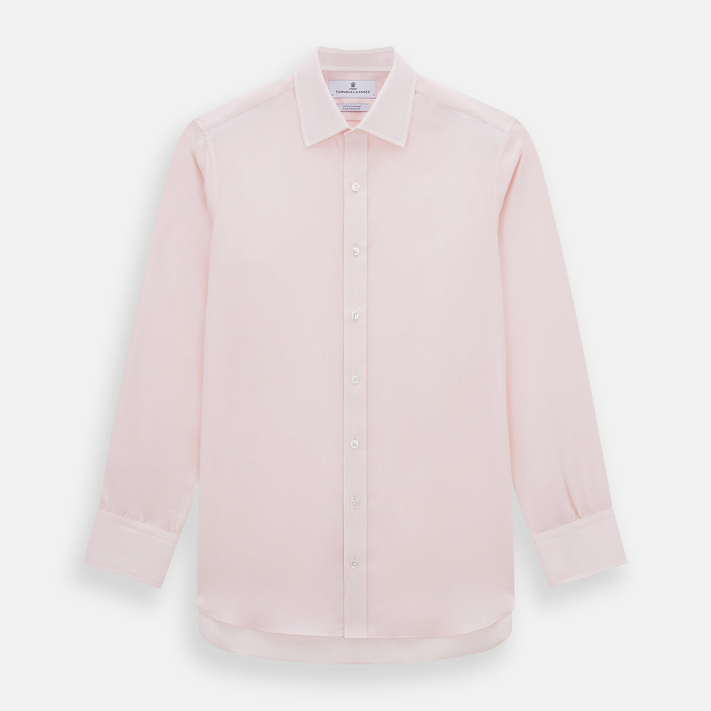 The Pale Pink Cotton Cashmere Mayfair Shirt by Turnbull & Asser features a classic collar, button-down front, and buttoned cuffs, crafted from a luxurious cotton-cashmere blend and displayed flat on a white background.