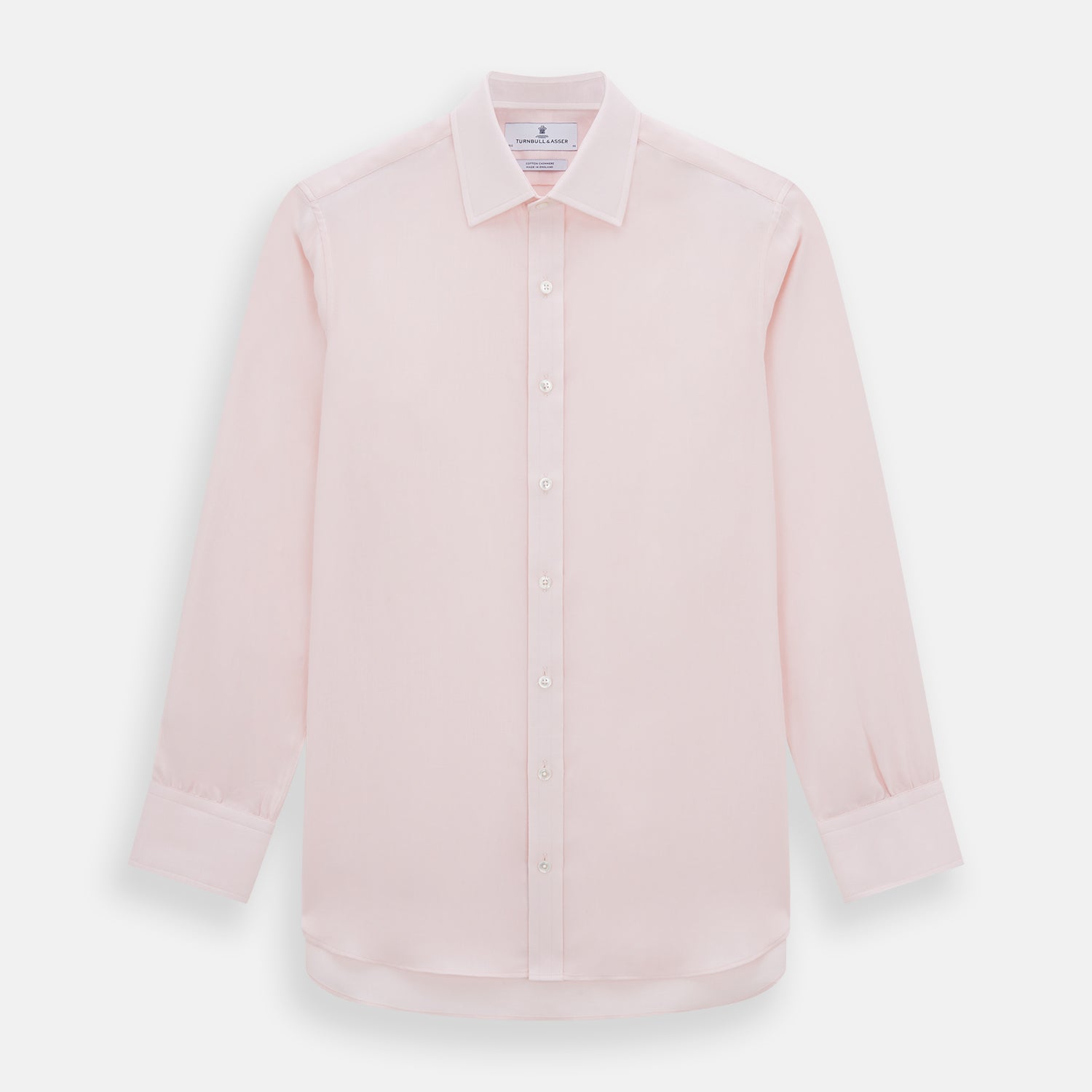 View 1 of product The Pale Pink Cotton Cashmere Mayfair Shirt by Turnbull & Asser features a classic collar, button-down front, and buttoned cuffs, crafted from a luxurious cotton-cashmere blend and displayed flat on a white background.
