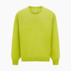 View 6 of product The Turnbull & Asser Lemon Green Cashmere Round Neck Jumper features long sleeves with ribbed cuffs and hem, displayed on a white background.