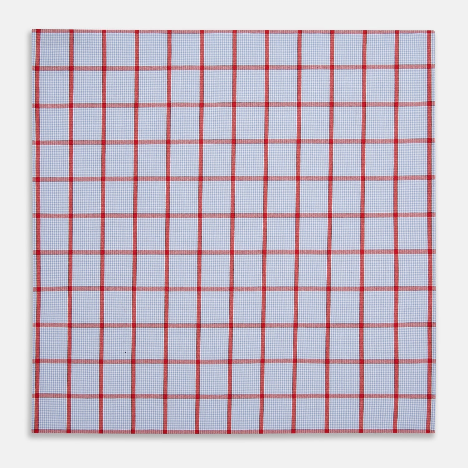 View 3 of product The Turnbull & Asser Hand Rolled Red Windowpane Check Handkerchief features a light blue and white gingham base with red checks—perfect as a gentleman's pocket square for a refined, classic touch.