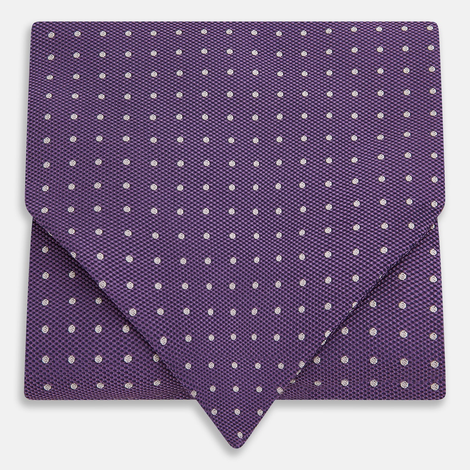 View 1 of product The Lilac and Purple Micro Dot Silk Cravat by Turnbull & Asser features evenly spaced white dots—offering an elegant, handmade accent to your formal ensemble or pocket square collection.