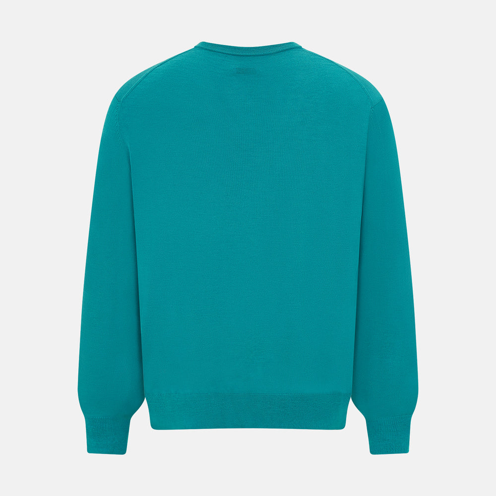 The Turnbull & Asser Turquoise Fine Merino V-Neck Jumper features long sleeves, ribbed cuffs and waistband, shown on a white background—a timeless choice for classic knitwear enthusiasts.