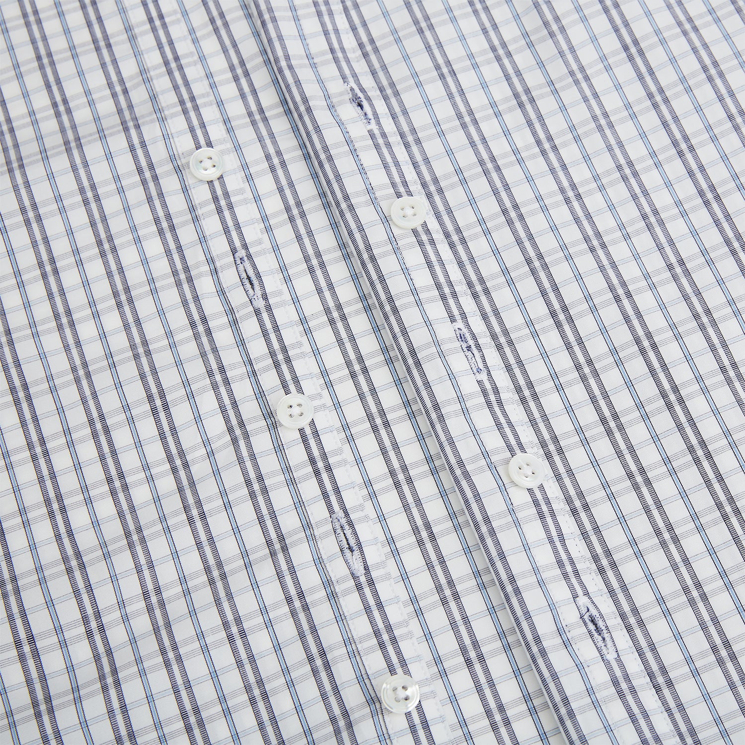 View 7 of product The Turnbull & Asser Navy and Blue Multi Tattersall Westminster Shirt features long sleeves, a button-down style, and a Turnbull collar in a blue and gray check pattern on white, laid flat against a white background.