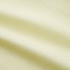 View 4 of product The Turnbull & Asser Yellow Linen Regular Fit Mayfair Shirt is a long-sleeve button-up with a collar and buttoned cuffs, shown laid flat on a white background.
