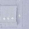 View 4 of product The Turnbull & Asser Blue Micro Graph Check Mayfair Shirt features long sleeves, a subtle check pattern, T&A collar, and buttoned cuffs, shown laid flat on a white background.