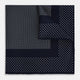 The Turnbull & Asser Navy and White Dot Silk Pocket Square features evenly spaced white polka dots on navy, a solid navy border, and one folded corner to reveal the reverse side, highlighting its fine handmade craftsmanship.