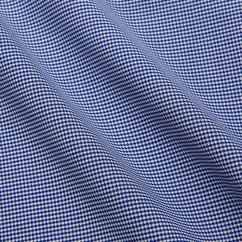 A navy pattern cotton voile regular fit Mayfair shirt by Turnbull & Asser, featuring long sleeves, a button-up front, classic collar, and white buttons, displayed flat against a white background.