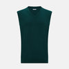 View 1 of product The Turnbull & Asser Moss Green Cashmere V-Neck Vest is a men's sleeveless knit sweater with a classic silhouette, shown against a plain white background.