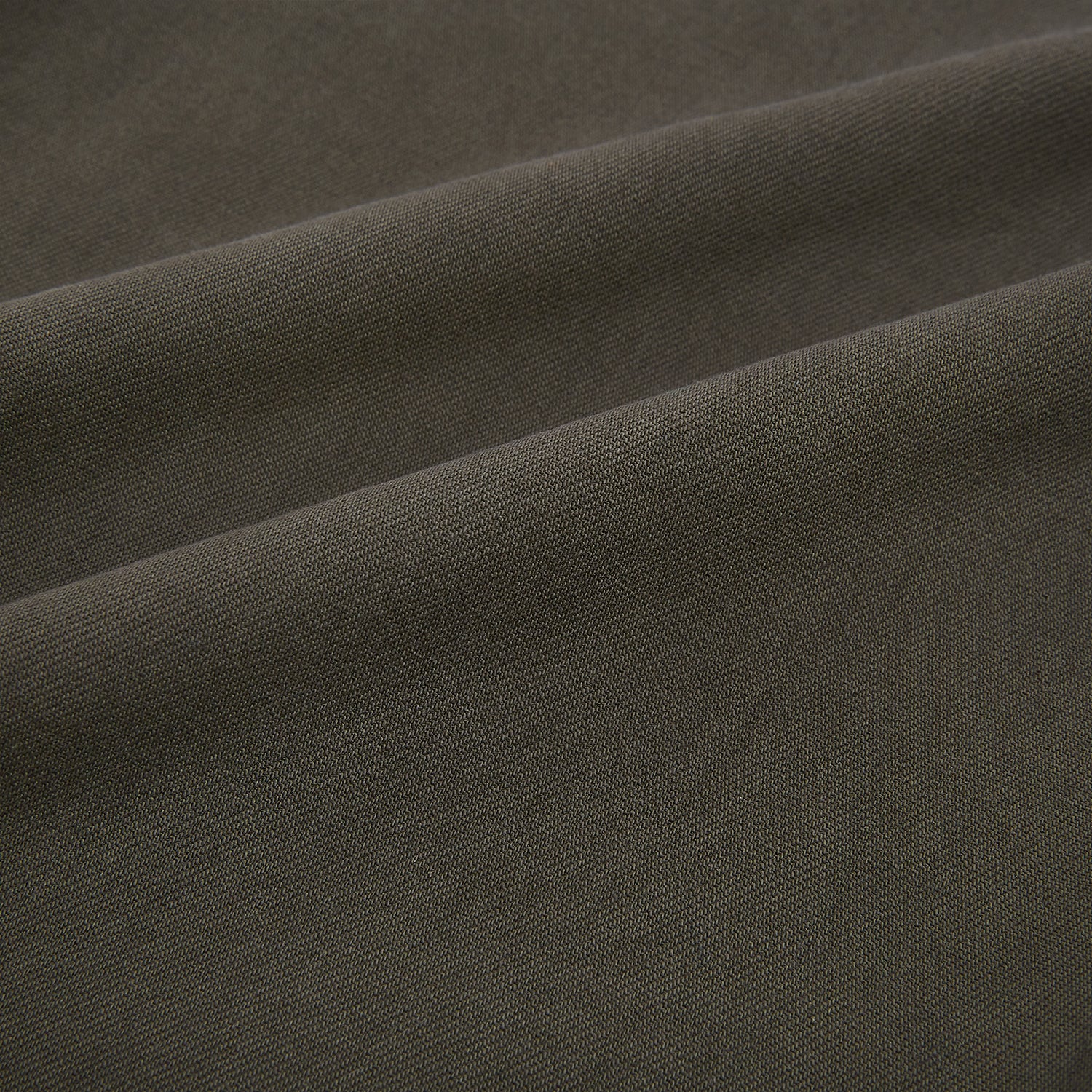 View 7 of product A pair of moss green Henry B trousers by Turnbull & Asser, crafted from Italian cotton with a straight-leg cut, belt loops, and a flat front, displayed against a plain white background.