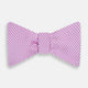 The Turnbull & Asser Pink and White Houndstooth Silk Bow Tie is shown against a plain white background, making it a stylish choice for formalwear.