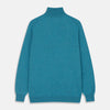 View 3 of product The Teal Lennox Half-Zip Jumper by Turnbull & Asser features a quarter-zip front, long sleeves, high collar, and ribbed cuffs and hem, shown laid flat on a light background.