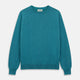 The Teal Glenn Crew Neck Jumper by Turnbull & Asser is shown against a white background, featuring a classic long-sleeve design with ribbed cuffs, collar, and hem.