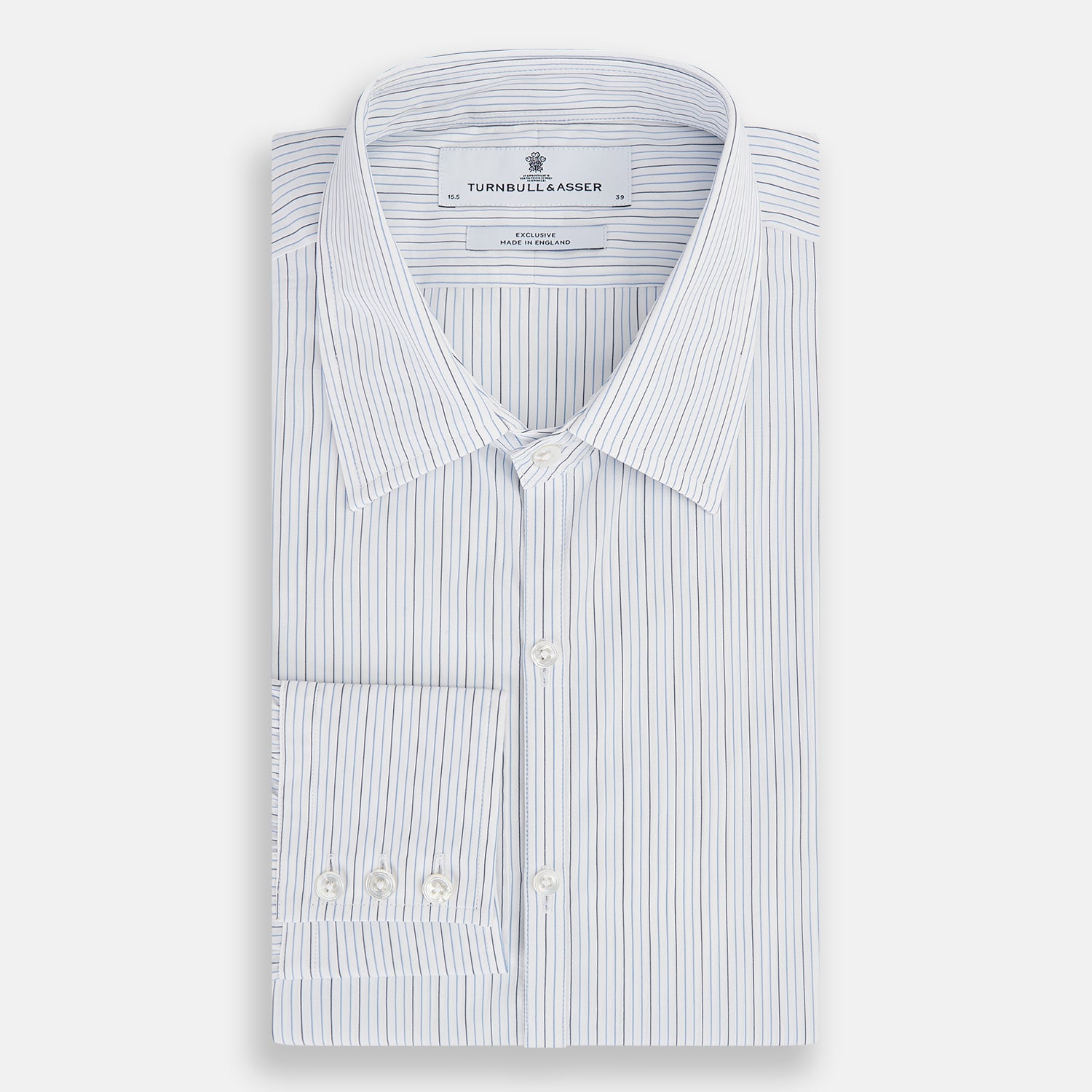 View 5 of product The Turnbull & Asser Pale Blue and Navy Pinstripe Westminster Shirt features long sleeves, a classic collar, and buttoned cuffs, highlighting British craftsmanship. The shirt is laid flat on a white background.