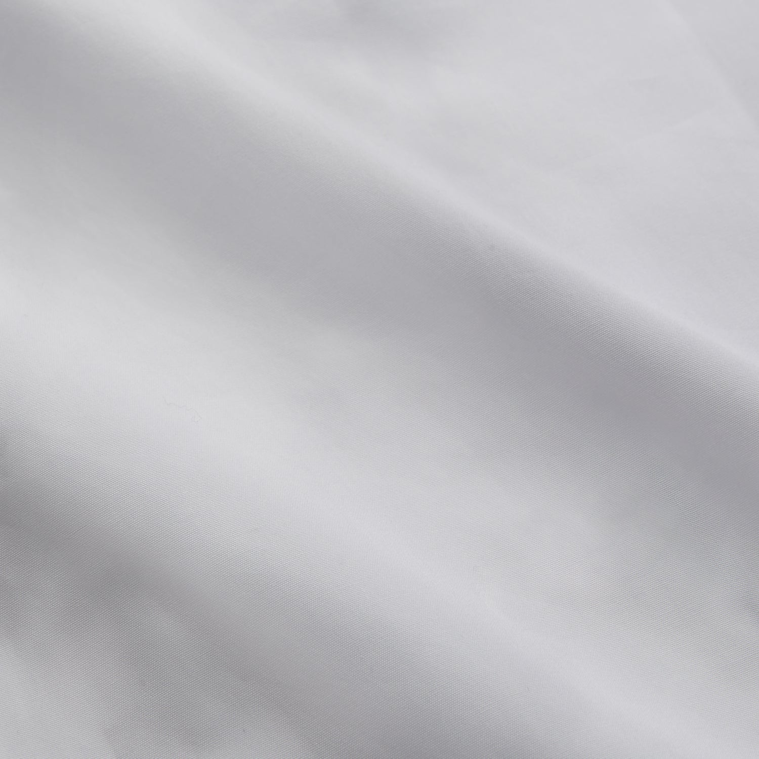 View 4 of product The Turnbull & Asser Women's Harriet Plain White Cotton Pyjama Set features long sleeves, black piping, a chest pocket, and matching pants with elastic waistband and ribbon tie, all displayed on a white background.