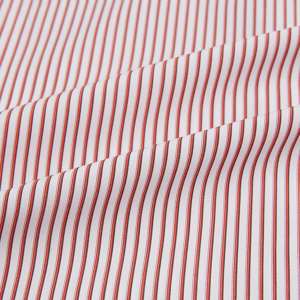 The Red Shadow Stripe Westminster Shirt by Turnbull & Asser features long sleeves, a Turnbull collar, thin red and white vertical stripes, white buttons, and showcases British craftsmanship against a plain white background.