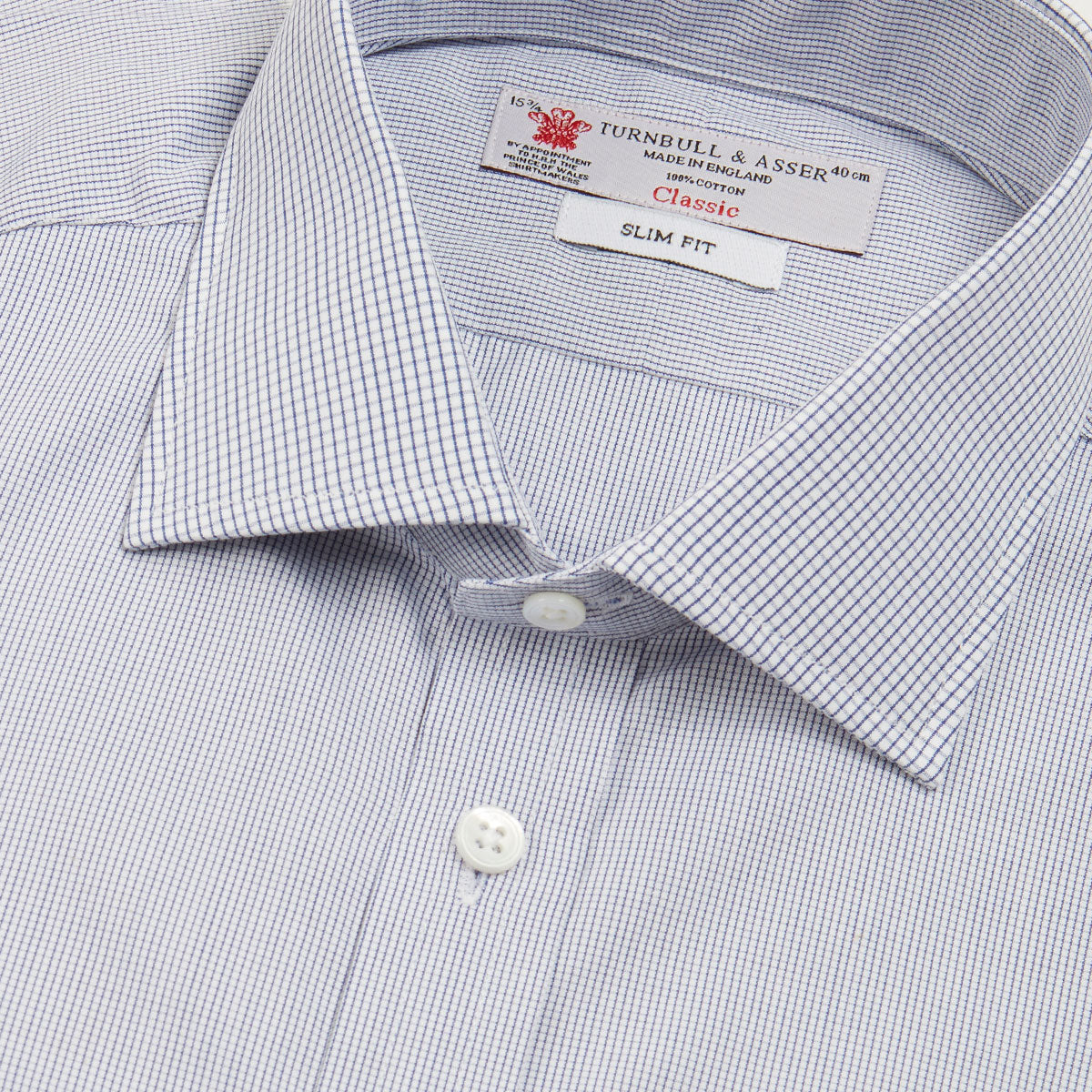 View 5 of product The Turnbull & Asser Slim Fit Blue Checked Shirt features long sleeves, contrasting white buttons, a regent collar, and distinct blue check pattern detailing on the cuff.