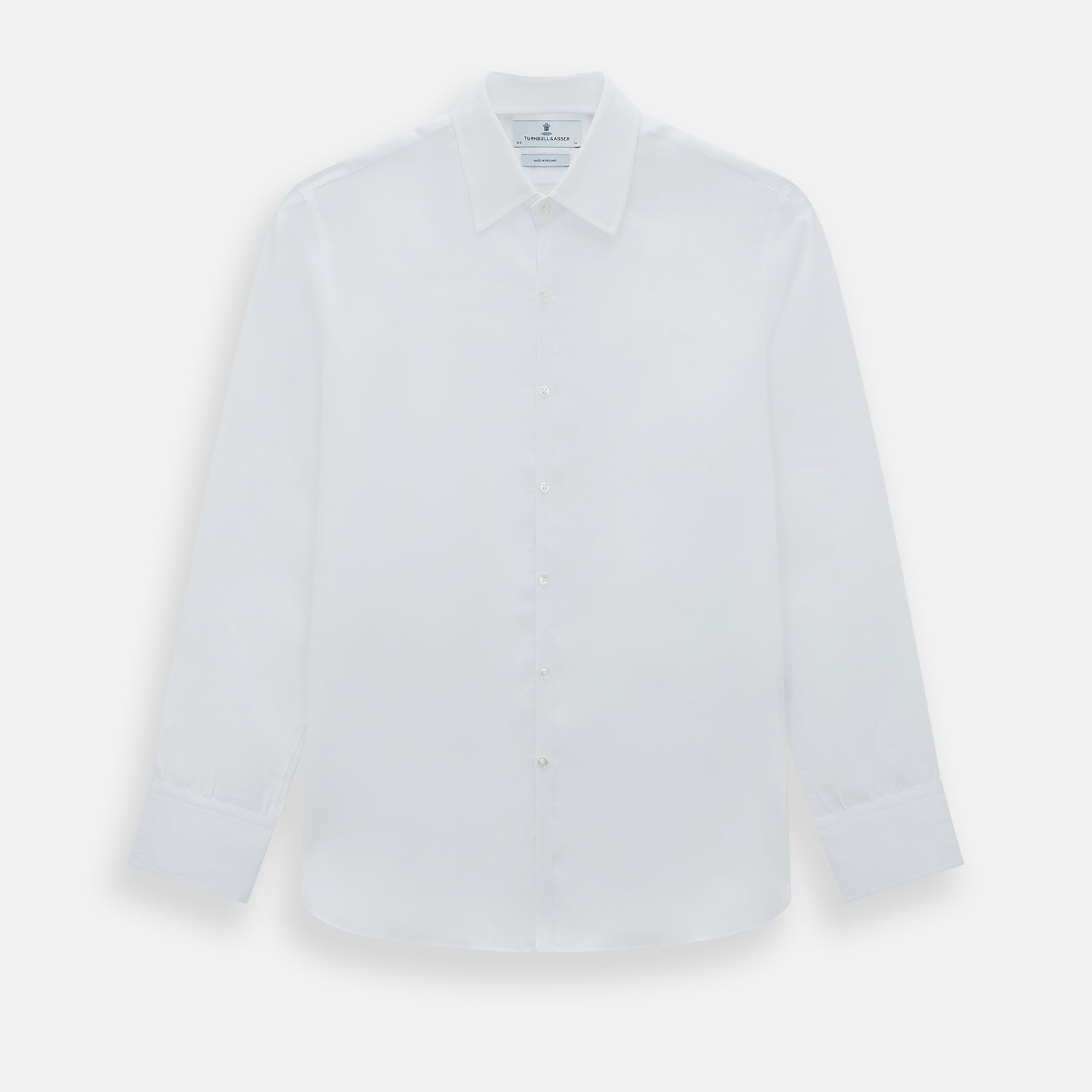 View 1 of product The White Linen Westminster Shirt by Turnbull & Asser features a classic Turnbull collar and button-down front, highlighting British craftsmanship against a plain white background.