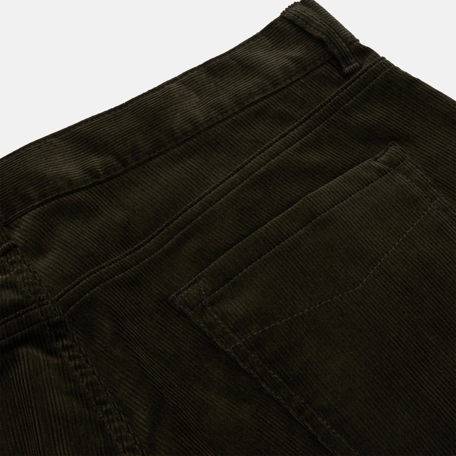View 2 of product A pair of Turnbull & Asser Olive Green Cord Mylo Trousers, featuring a slim fit, five-pocket design, button closure, and belt loops, is shown laid flat on a white background.