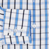 View 4 of product The Turnbull & Asser Blue and Navy Combination Check Mayfair Shirt features a classic button-up style with long sleeves, T&A collar, and a blue, navy, and white check pattern, shown against a plain white background.