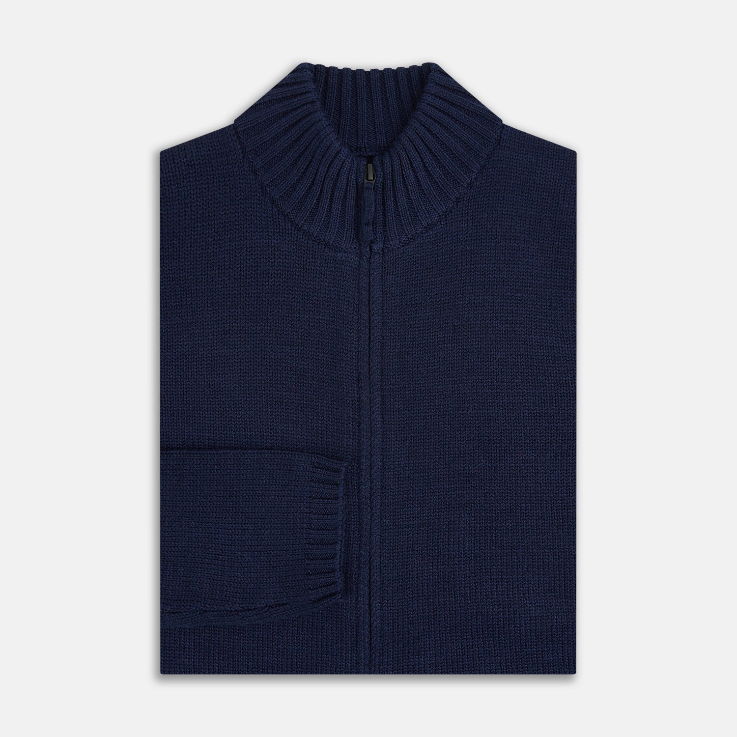 View 4 of product The Turnbull & Asser Navy High Neck Merino Zipped Cardigan is a long-sleeve knit with ribbed mock neck, cuffs, and hem, shown on a plain white background.