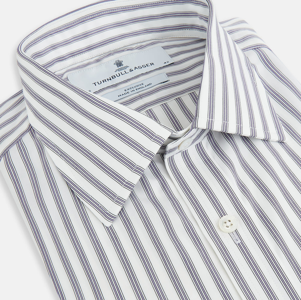 The Purple Multi Stripe Mayfair Shirt from Turnbull & Asser is a pure cotton, collared long-sleeve shirt with white and gray vertical stripes and buttoned cuffs, displayed flat on a white background.