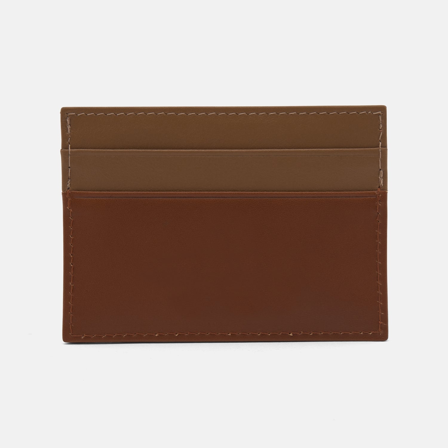 View 2 of product The Brown Leather Card Case by Turnbull & Asser is a minimalist brown and tan accessory crafted from premium bridle hide leather.