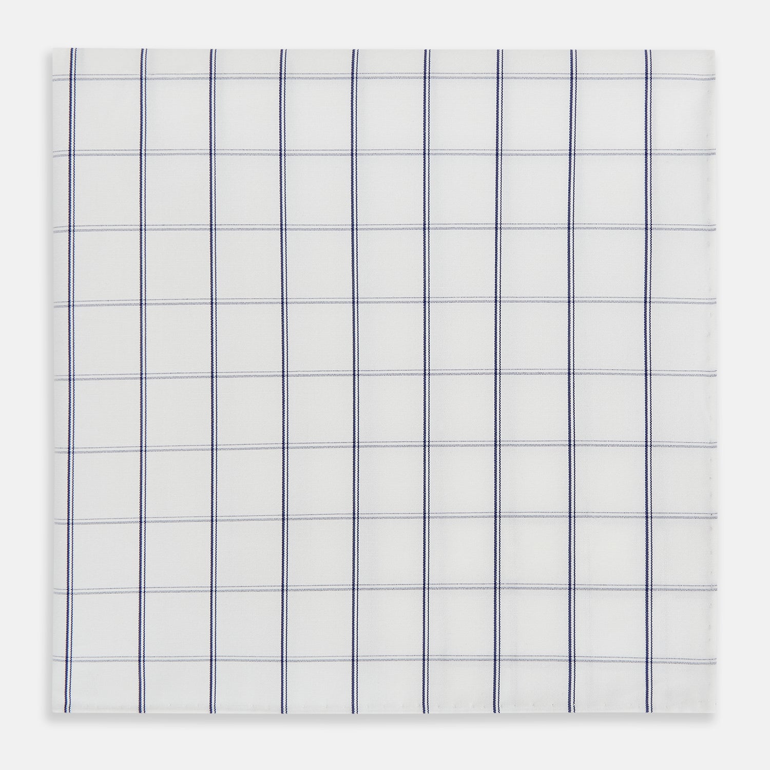 View 1 of product The Turnbull & Asser Dark Navy Double-Line Check Hand-Rolled Handkerchief features a white base with intersecting navy lines and hand-rolled edges, expertly crafted in England.