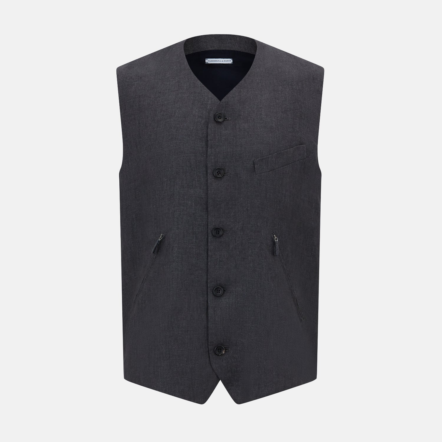 View 1 of product The Turnbull & Asser Ash Linen Twill Waistcoat is a dark gray, sleeveless V-neck with three front buttons, a chest pocket, and two diagonal zippered pockets in subtly textured twill. Shown on a plain white background.