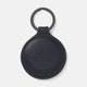 The Dark Navy Leather Fob Holder by Turnbull & Asser features round, dark blue leather with subtle embossed branding and a metallic key ring.