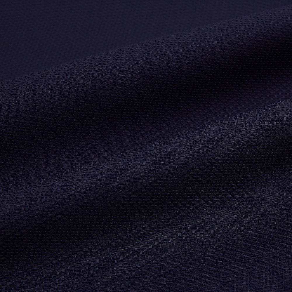 The Navy Textured Windsor Shirt by Turnbull & Asser features long sleeves, a Windsor collar, buttoned cuffs, and white buttons—a fine example of British craftsmanship—set against a plain white background.