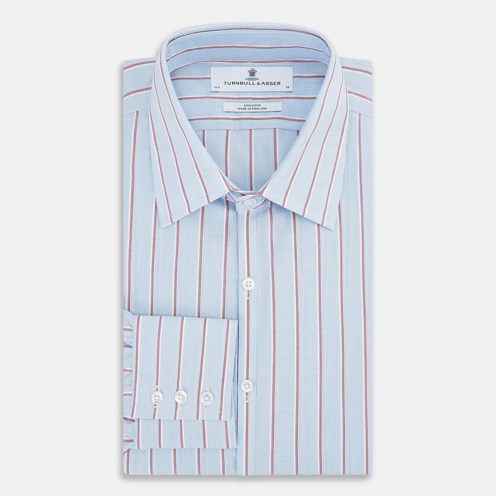 The Turnbull & Asser Blue and Burgundy Multi-Stripe Westminster Shirt features a pointed collar and long sleeves, laid flat on a white background to highlight its fine British craftsmanship.