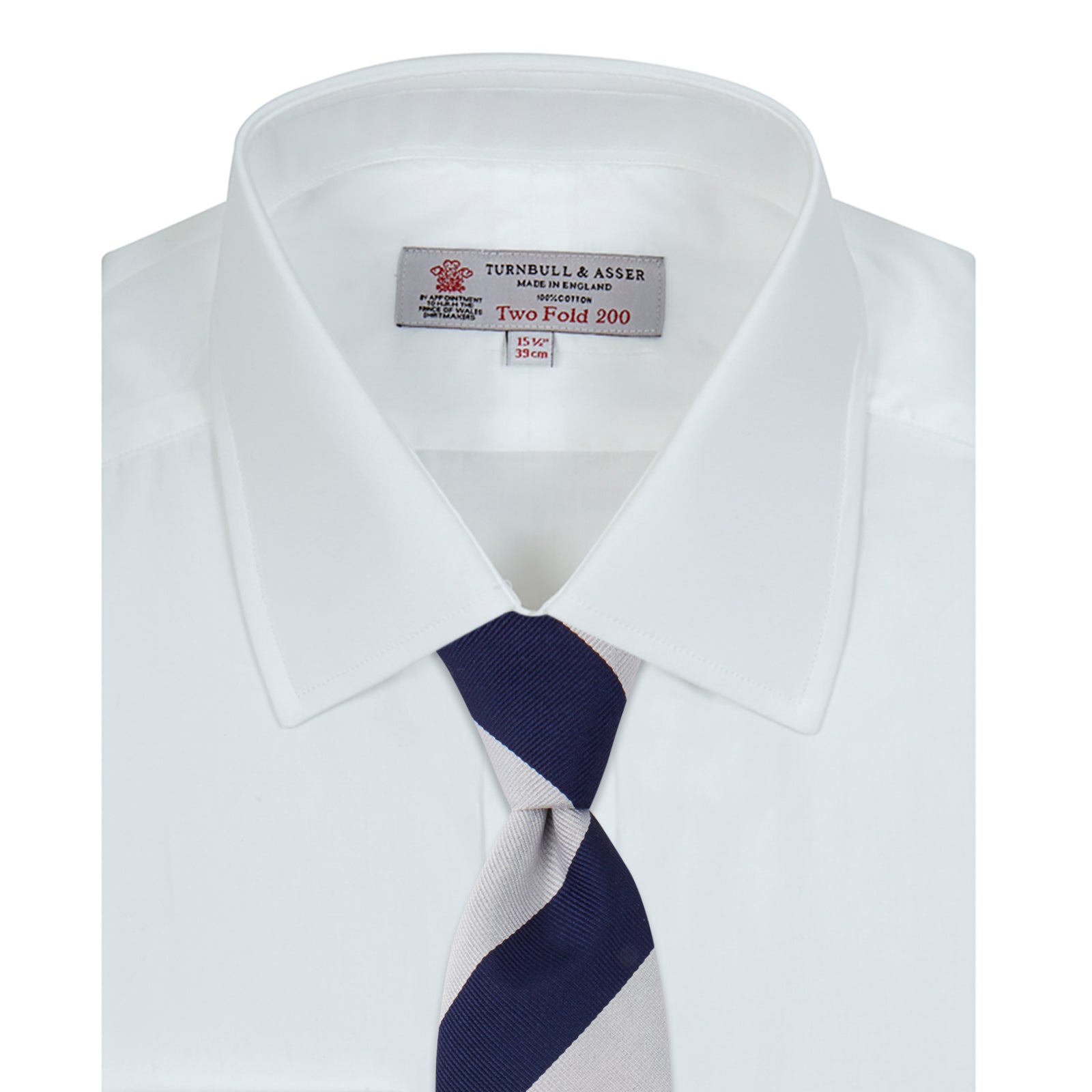 View 4 of product A Turnbull & Asser Two-Fold 200 White Cotton Shirt with T&A collar and double cuffs, neatly folded to show the label inside the collar, is displayed on a light blue background.