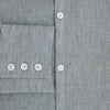 View 4 of product The Grey Linen Westminster Shirt by Turnbull & Asser is a long-sleeve, light gray button-up with a formal collar and white buttons, highlighting British craftsmanship and laid flat on a white background.