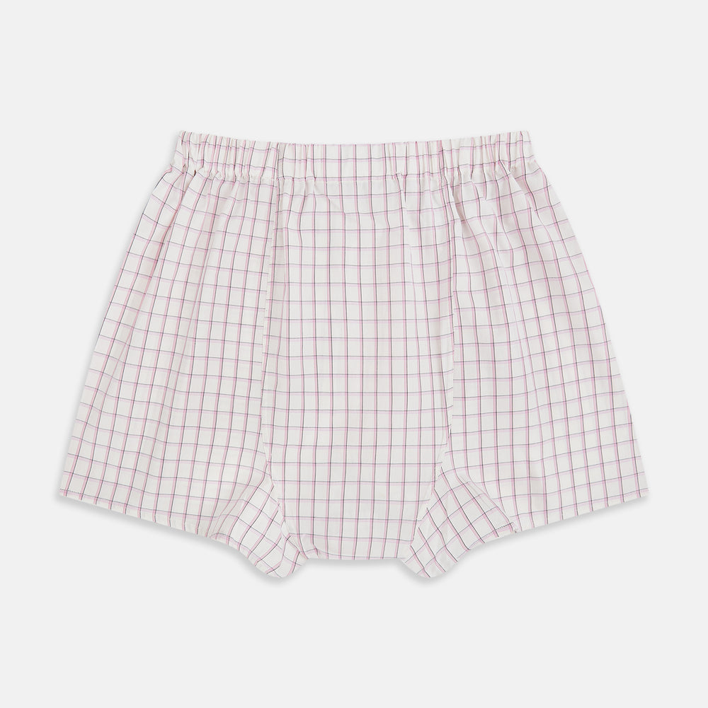 The Pink Graph Check Godfrey Boxer Shorts by Turnbull & Asser feature a comfortable waistband and thin pink grid lines on cotton. These luxury boxers are shown laid flat against a white background.