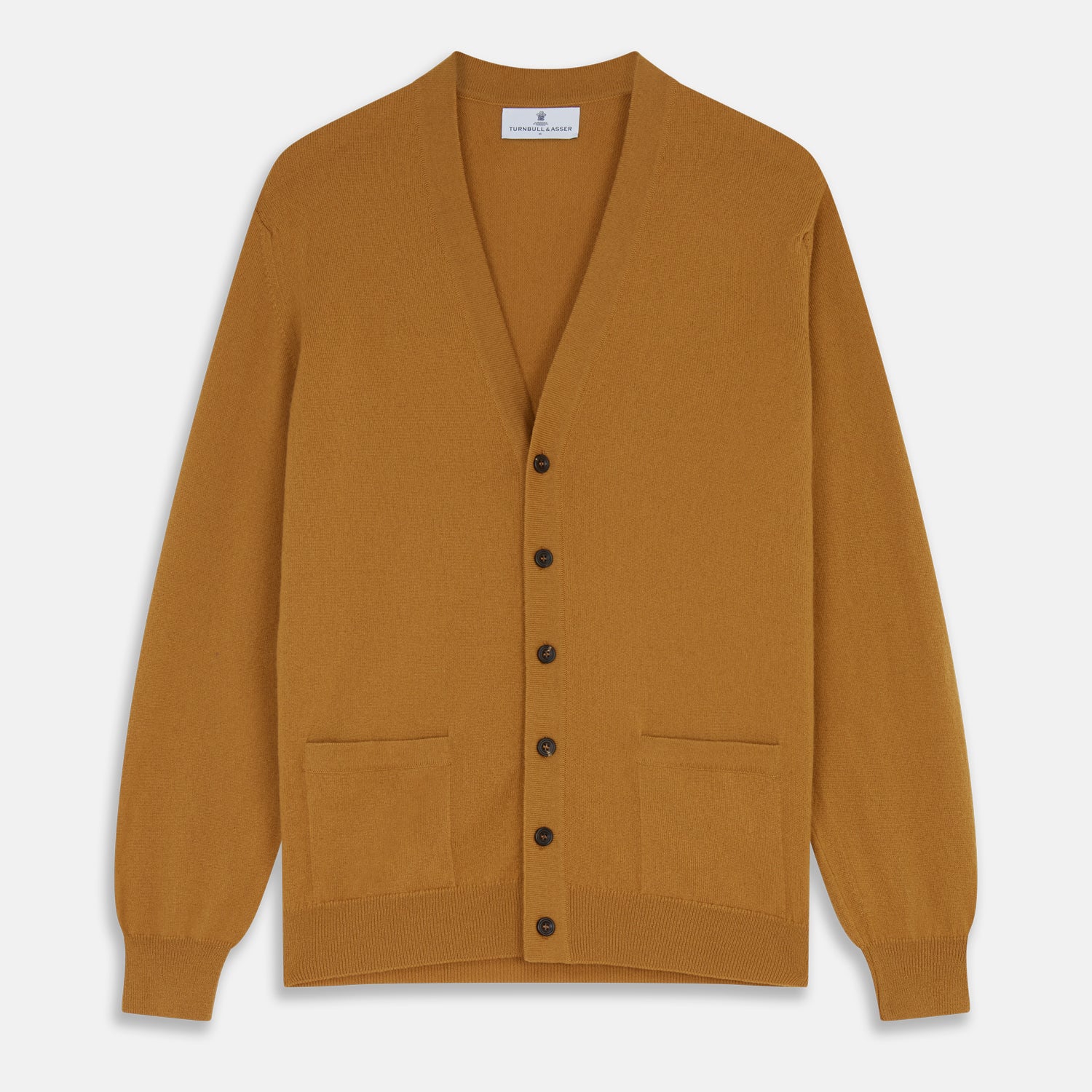 View 1 of product The Turnbull & Asser Golden Brown Cashmere Lachlan Cardigan features long sleeves, front buttons, two front pockets, and ribbed cuffs and hem—a luxurious knitwear piece shown laid flat on a white background.