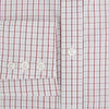 View 4 of product The Turnbull & Asser Red Tattersall Check Mayfair Shirt features long sleeves, a collar, and Italian cotton with a red tattersall check on white, shown flat against a white background.