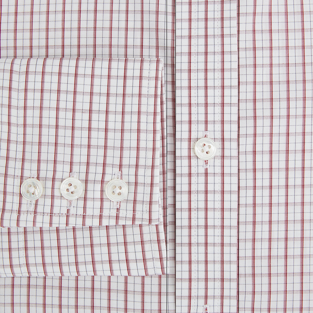 The Turnbull & Asser Red Tattersall Check Mayfair Shirt features long sleeves, a collar, and Italian cotton with a red tattersall check on white, shown flat against a white background.