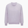 View 6 of product The Turnbull & Asser Lilac Cashmere Round Neck Jumper for men features long sleeves with ribbed cuffs and hem, offering a stylish, refined look. Shown against a white background.