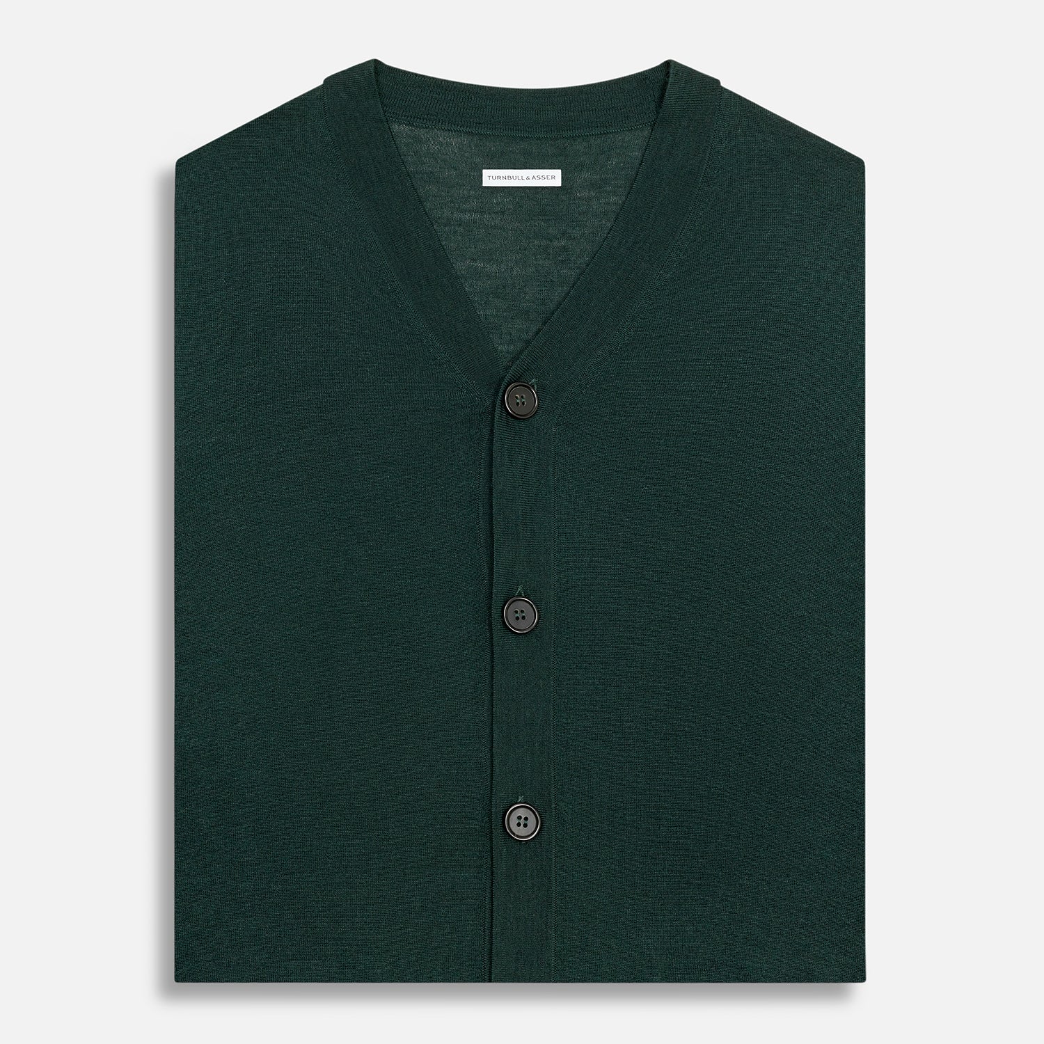 View 4 of product The Turnbull & Asser Petrol Green Fine Merino V-Neck Sleeveless Cardigan features two front pockets, a button-up design, and is shown against a plain white background.