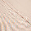View 7 of product The Orange Multi Stripe Westminster Shirt by Turnbull & Asser features thin vertical orange and white stripes, a Turnbull collar, and long sleeves, elegantly displayed flat against a white background.