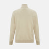 View 3 of product The Turnbull & Asser Cream Half-Zip Cashmere Jumper is a beige, long-sleeve pullover with a high collar, showcasing timeless knitwear style against a plain white background.