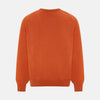 View 3 of product The Turnbull & Asser Rust Cashmere V-neck Jumper features long sleeves, ribbed cuffs and hem, and is shown against a plain white background.