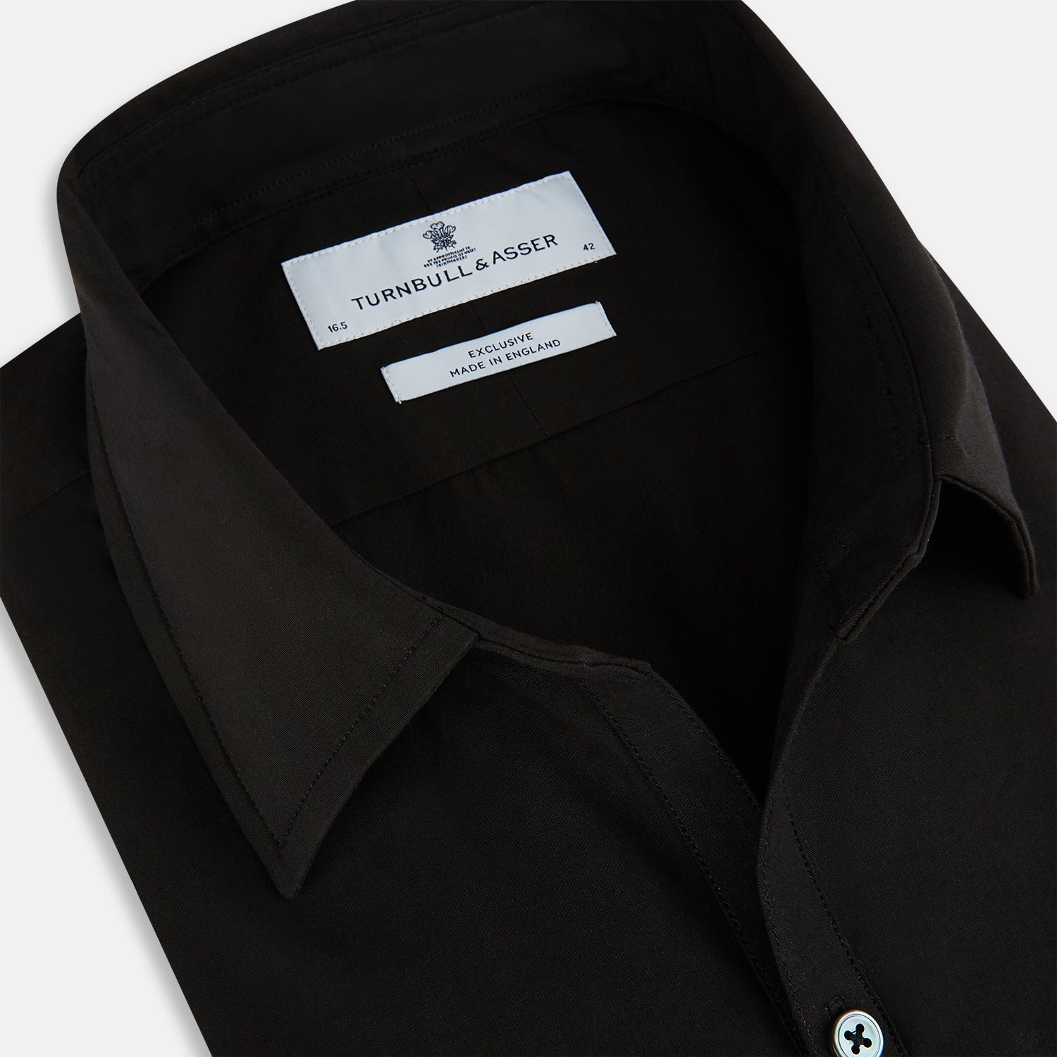 View 2 of product A long-sleeved, collared MIDNIGHT BLUE WINDSOR SHIRT by Turnbull & Asser, laid flat on a white background, highlights classic British craftsmanship.