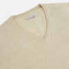 View 2 of product The Turnbull & Asser Ivory Cashmere V-Neck Jumper, with long sleeves and ribbed cuffs and hem, is shown against a plain white background.