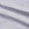 View 4 of product The Turnbull & Asser Faded Blue Block Check Cotton Regular Fit Mayfair Shirt, featuring long sleeves, a classic collar, and white buttons, is neatly laid flat on a white background.