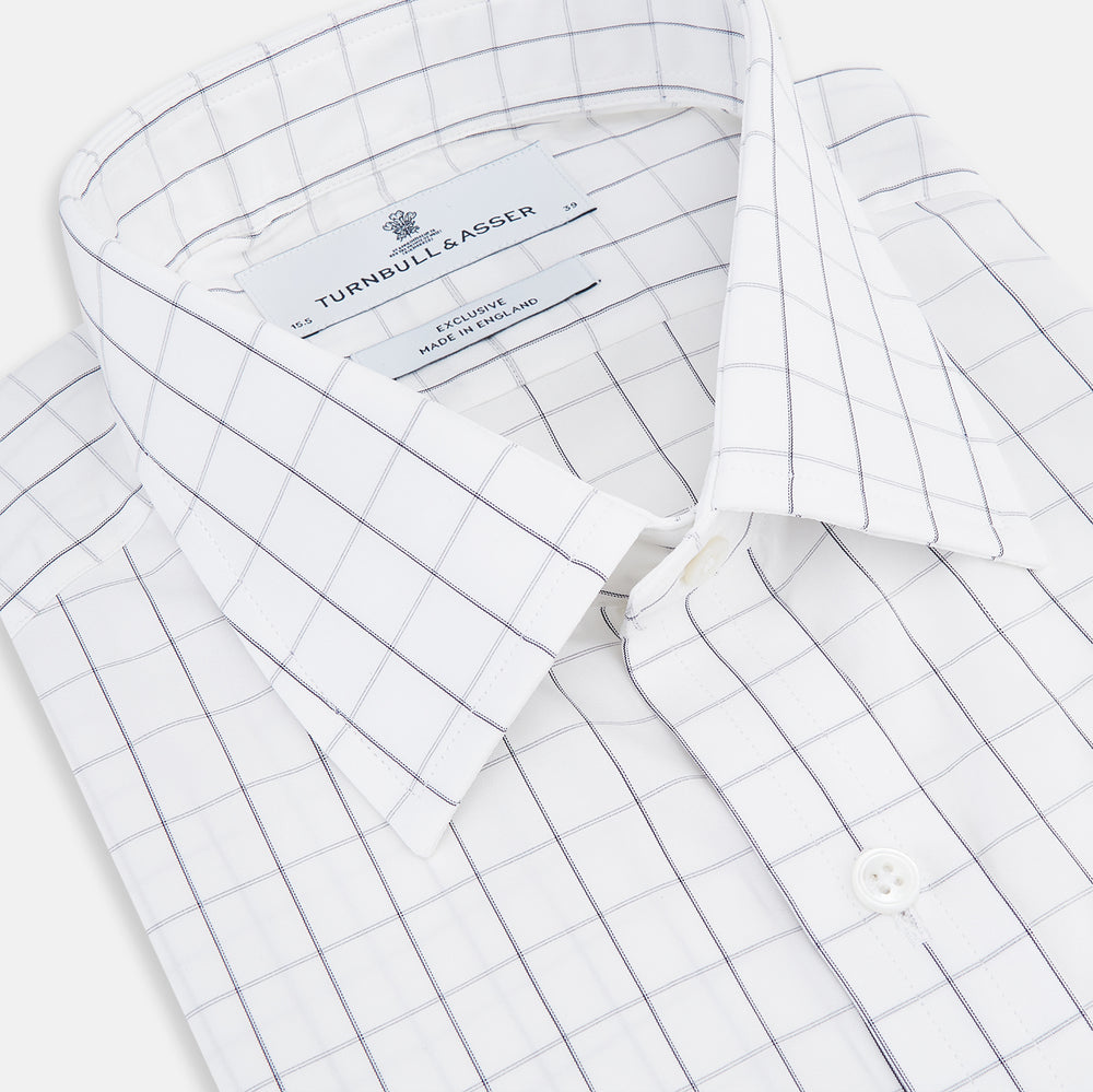 A long-sleeve, button-down Navy Blue Hairline Multi Stripe Mayfair Shirt by Turnbull & Asser is displayed flat against a white background.