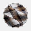 View 1 of product Close-up of Turnbull & Asser’s Brown Multi Check Linen Fabric, featuring a pattern of black, brown, and white intersecting lines within a circular frame on a light gray background. The linen surface is slightly wrinkled.